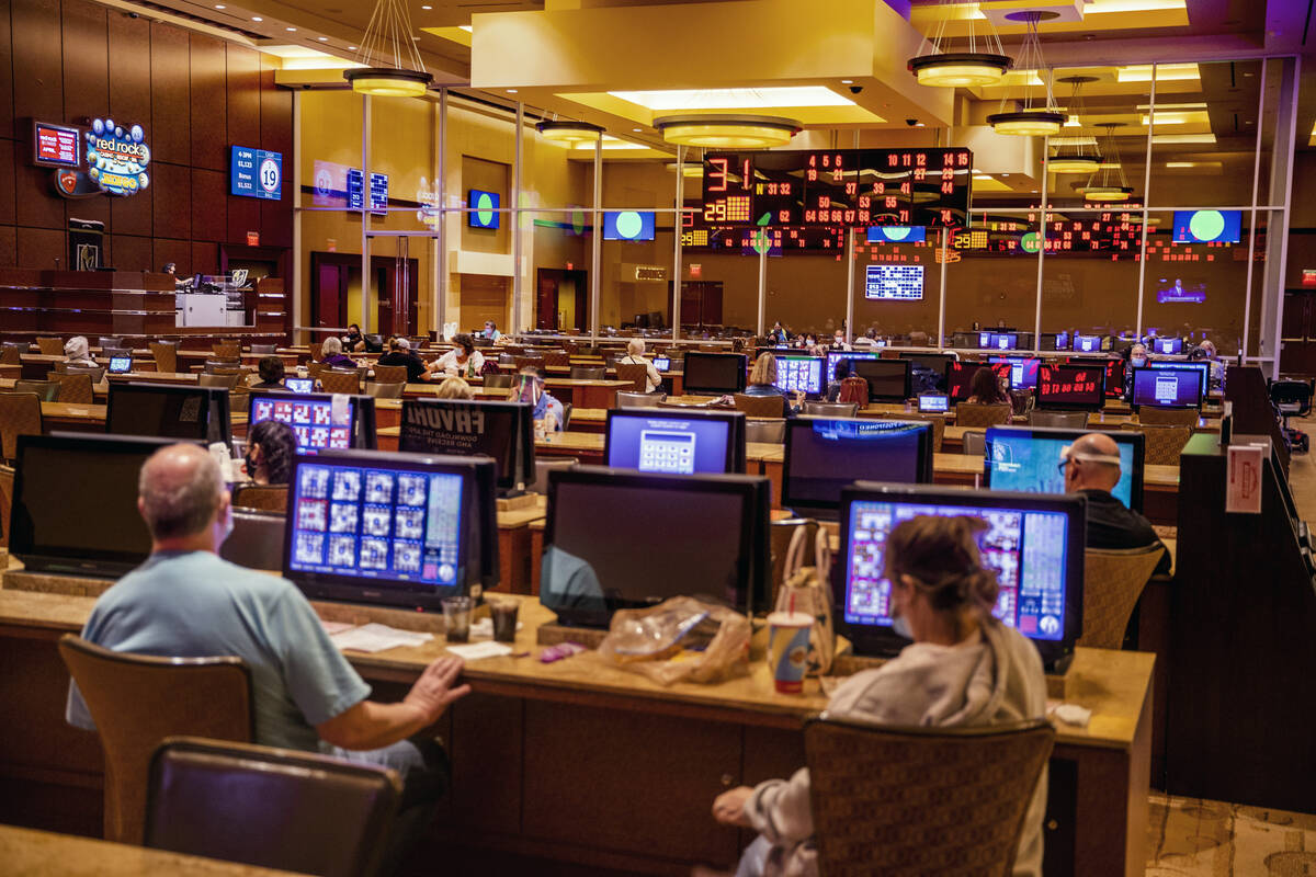 Players relax with food and drink while playing at the Red Rock Bingo Room within the Red Rock ...