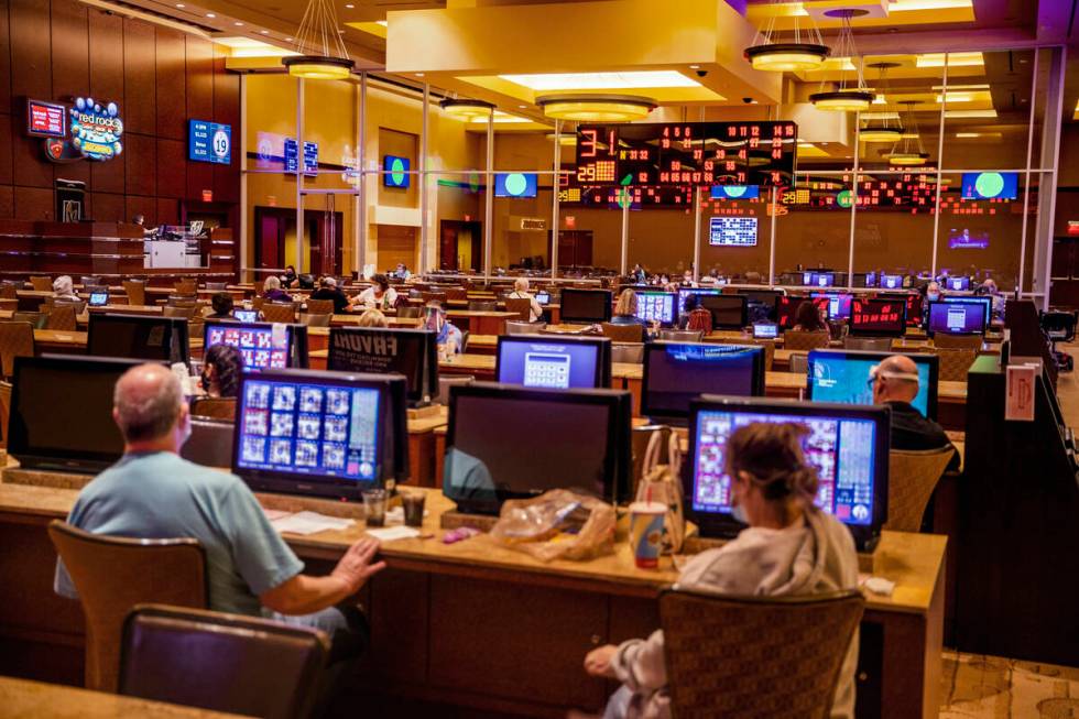 Players relax with food and drink while playing at the Red Rock Bingo Room within the Red Rock ...