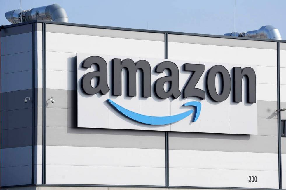 An Amazon company logo marks the facade of a building in Schoenefeld near Berlin, March 18, 202 ...