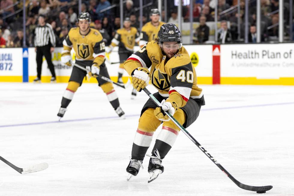 Golden Knights defenseman Lukas Cormier (40) snags the puck on a Kings pass during the second p ...