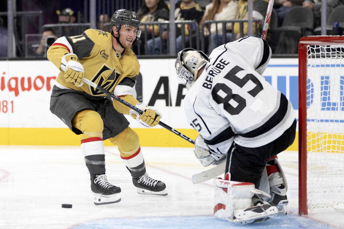 Kings goaltender Jean-Francois Berube (85) saves Golden Knights forward Mason Morelli’s ...