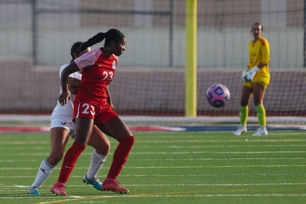 Coronado forward Sierah McCallum (23) chases after the ball as Palo Verde forward Juliette Karc ...