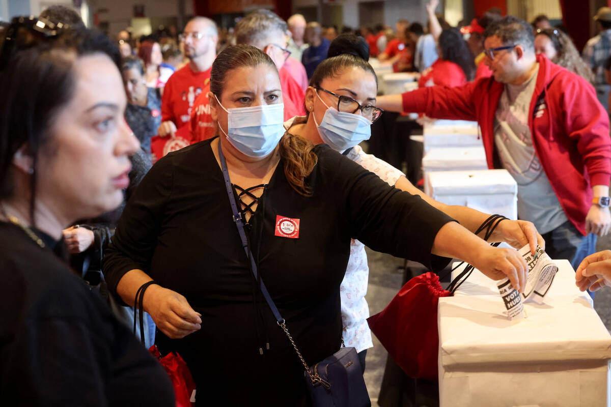 Culinary Union members cast their ballots during a strike vote at Thomas & Mack Center on t ...