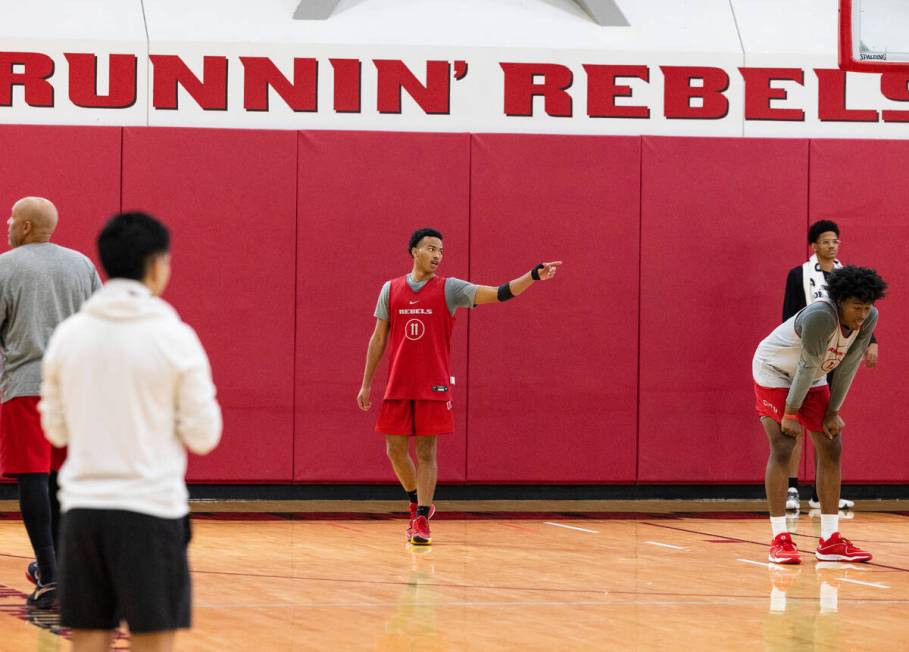 UNLV Rebels point guard Dedan Thomas Jr., (11) directs his teammates during team practice, on W ...