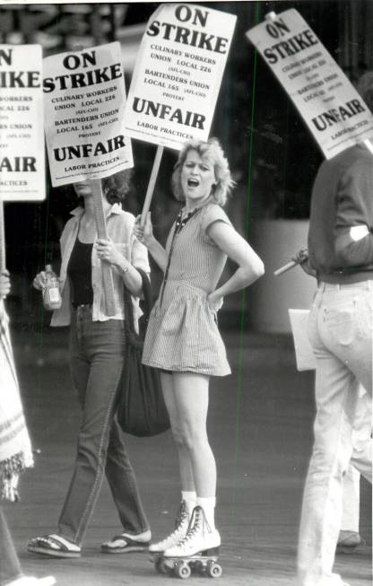 Picketers at the Union Plaza, one on roller skates, in April 1984. (Las Vegas Review-Journal)