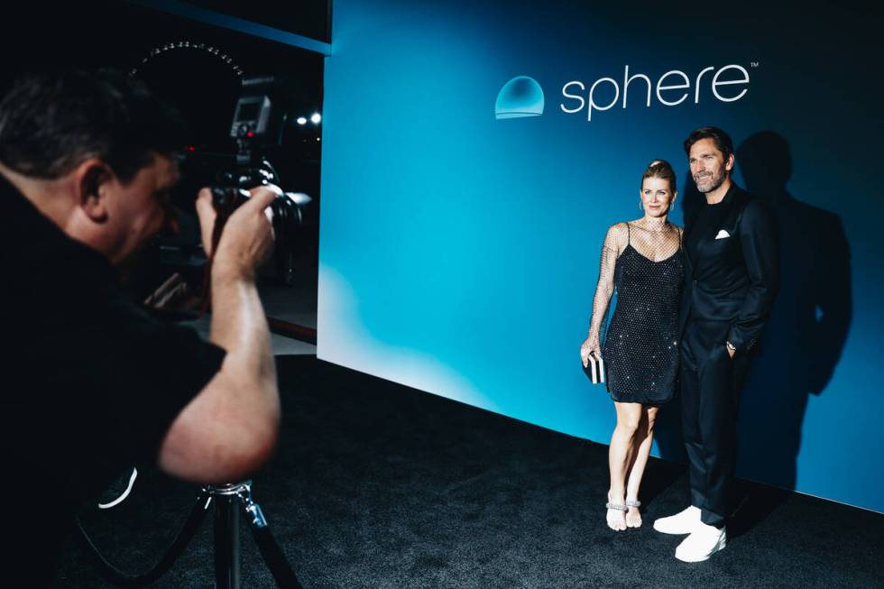 Henrik Lundqvist, right, and his wife, Therese Andersson, pose for photographs outside of the S ...