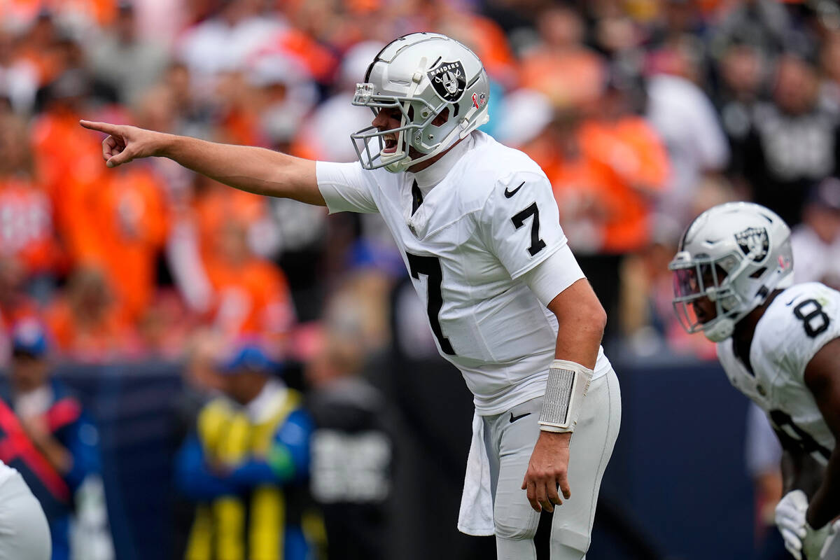 Las Vegas Raiders quarterback Brian Hoyer (7) calls a play against the Denver Broncos during th ...