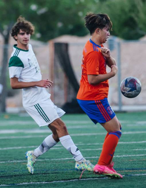 Bishop Gorman’s Rockwell Rabago (22) kicks the ball during a game against Palo Verde at ...