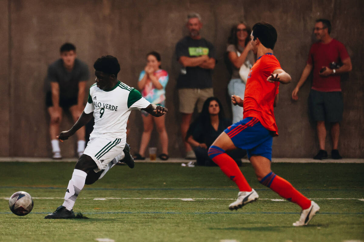 Palo Verde forward Quinton Alewine (9) kicks the ball towards the goal during a game against Bi ...
