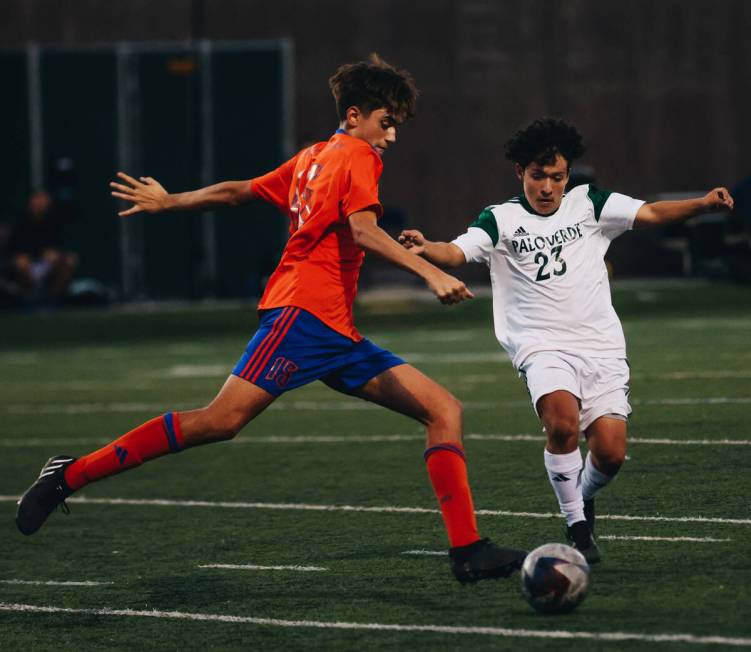 Palo Verde forward Daniel Mercado (23) and Bishop Gorman’s Massimiliano Musi (15) chose ...