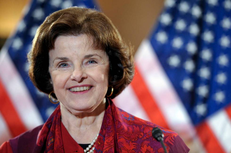 FILE - Sen. Dianne Feinstein, D-Calif., smiles after announcing the introduction of a Senate bi ...