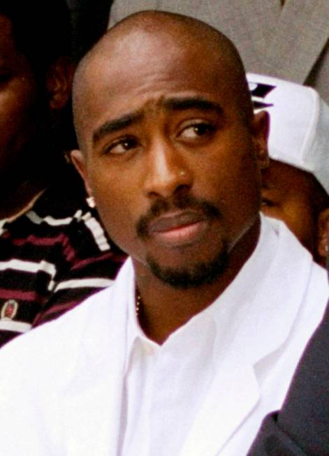 FILE - Rapper Tupac Shakur attends a voter registration event in South Central Los Angeles, Aug ...