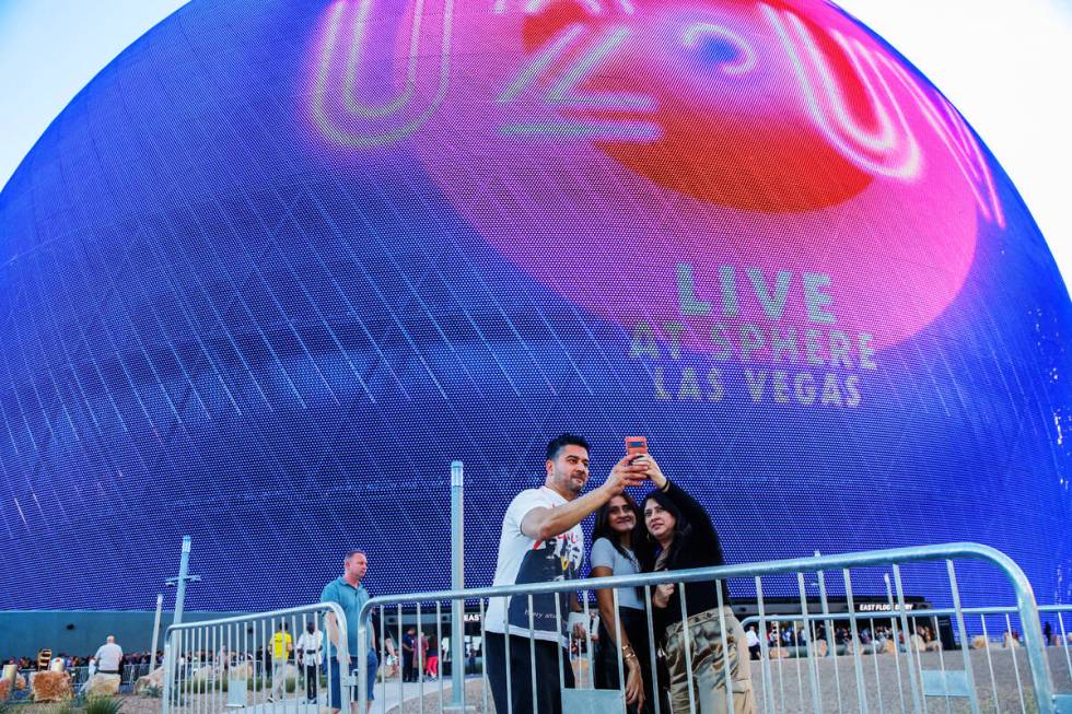 Excited fans wait outside of the Sphere on the night of its inaugural performance featuring U2 ...