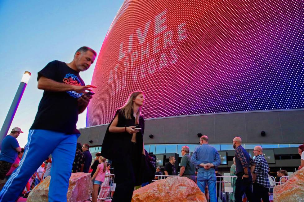 Excited fans wait outside of the Sphere on the night of its inaugural performance featuring U2 ...