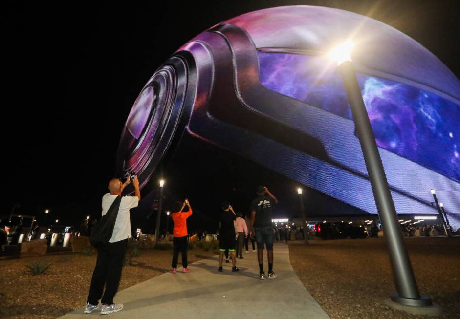 Excited fans wait outside of the Sphere on the night of its inaugural performance featuring U2 ...