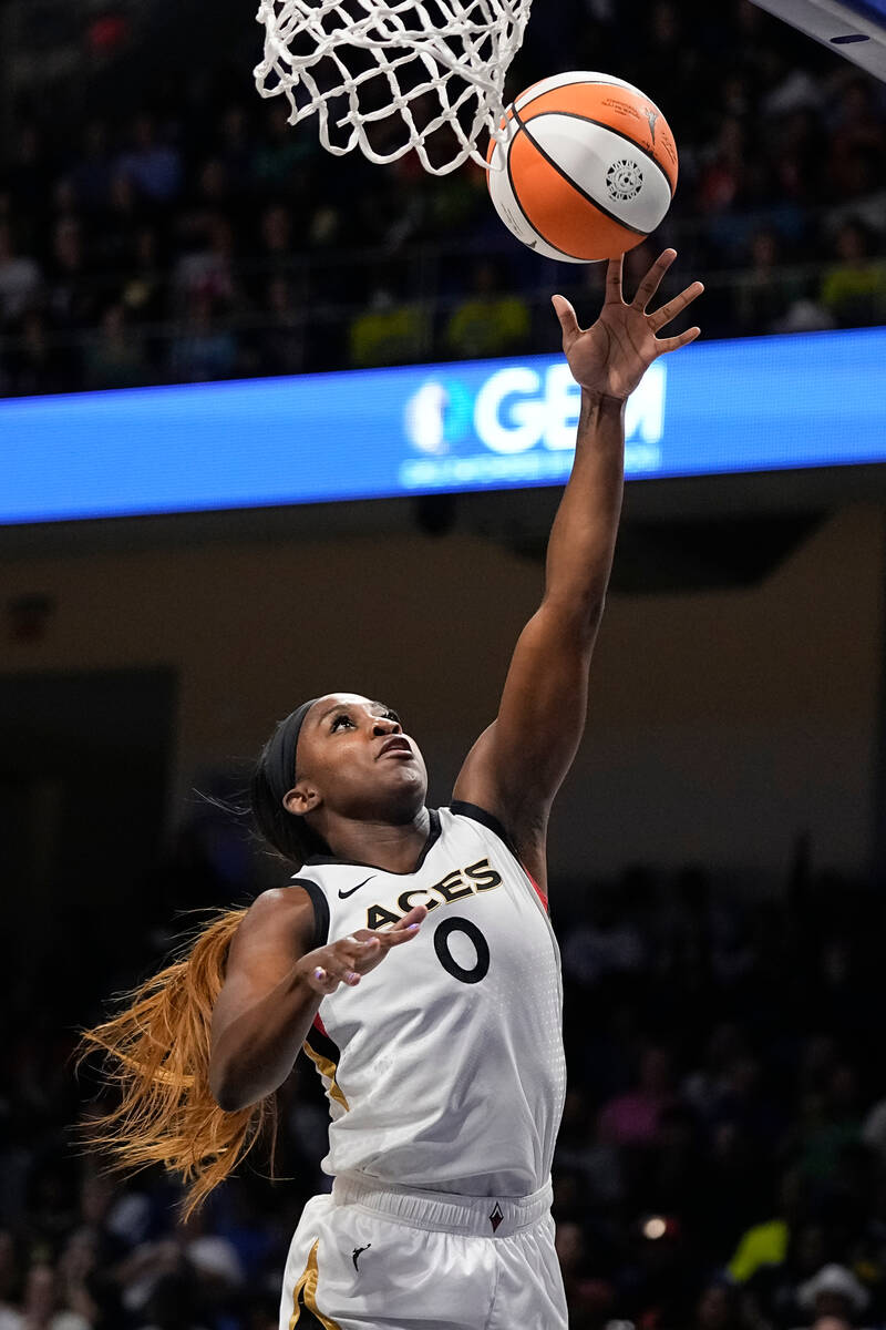 Las Vegas Aces guard Jackie Young shoots a layup against the Dallas Wings during the first of G ...