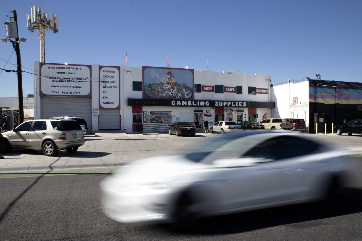 A vehicle drives on Main Street past Spinetti's Gaming Supplies on Tuesday, Sept. 26, 2023, in ...