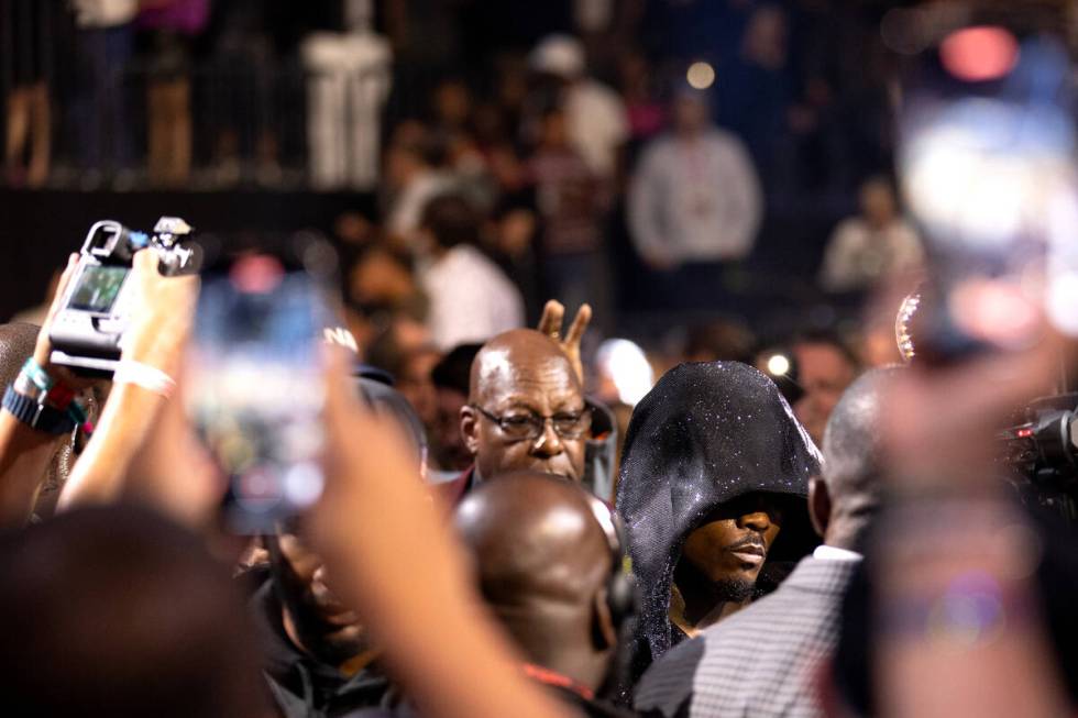 Jermell Charlo makes way toward the ring before his undisputed world super middleweight title b ...