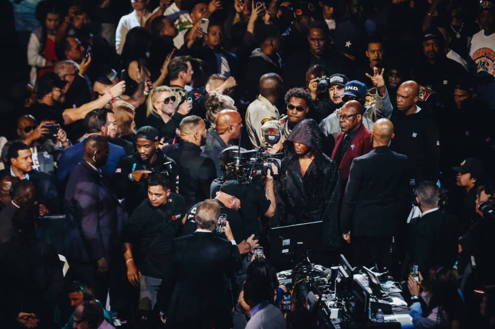 Jermell Charlo makes his grand entrance during an undisputed world super middleweight title box ...