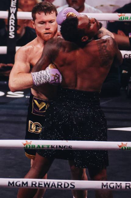 Canelo Alvarez and Jermell Charlo box during an undisputed world super middleweight title boxin ...