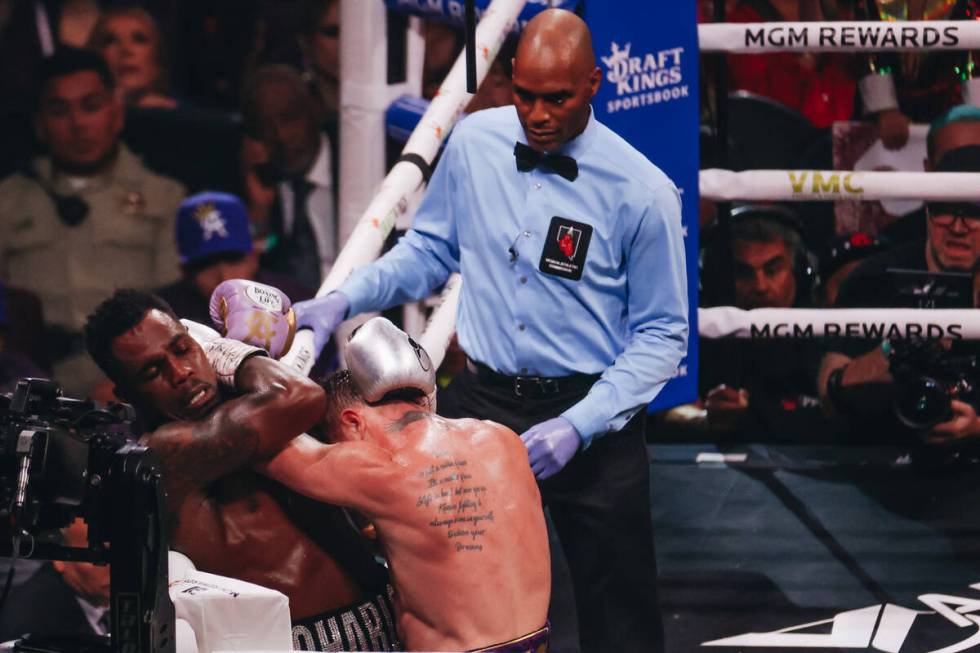 Canelo Alvarez and Jermell Charlo box during an undisputed world super middleweight title boxin ...