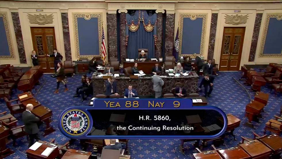 This image from U.S. Senate video shows the vote total, 88-9, on a temporary funding bill in th ...