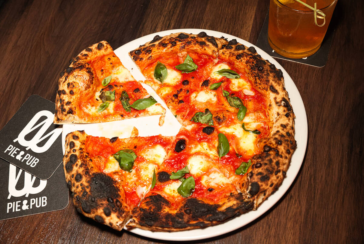 The Margherita pizza with red sauce, garlic, Sicilian oregano and olive oil at ØØ Pie ...