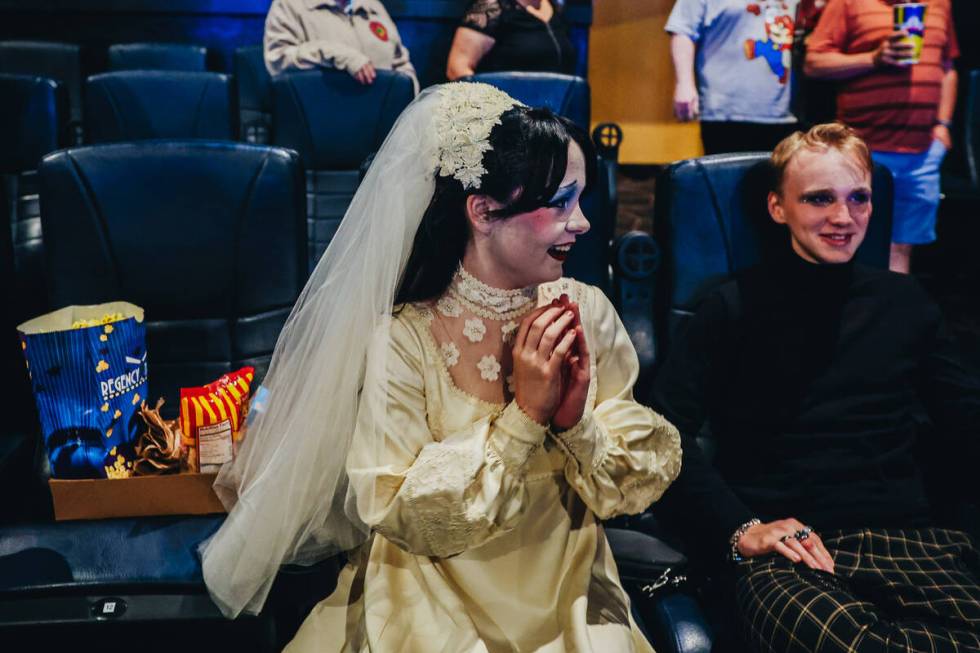 Stella Finnegan, left, gets excited for a live cast showing of “Rocky Horror Picture Sho ...