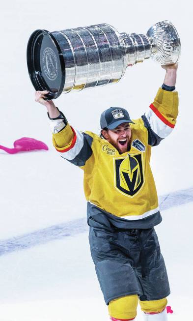 Golden Knights right wing Jonathan Marchessault (81) hoists the Stanley Cup after defeating the ...