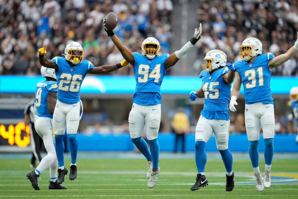 Los Angeles Chargers linebacker Chris Rumph II (94) reacts after recovering a fumble against th ...