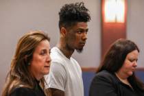 Johnathan Jamall Porter, a rapper known as Blueface, appears in court alongside his attorneys, ...