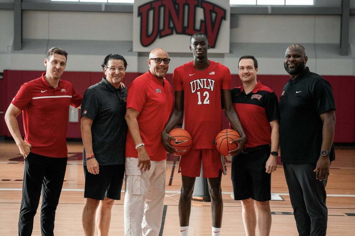 UNLV commit Pape N'Diaye poses with the coaching staff during a recruiting visit. (Pape N'Diaye)