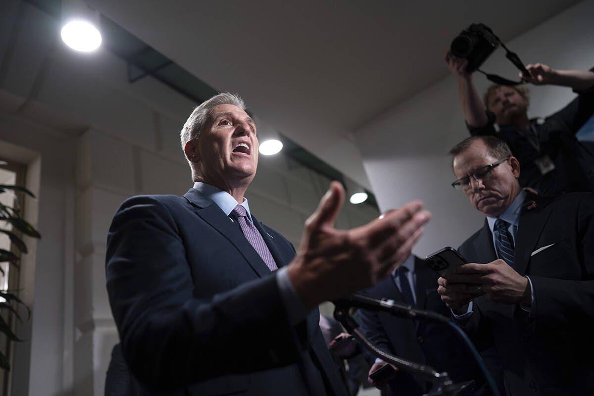 Speaker of the House Kevin McCarthy, R-Calif., talks to reporters after a closed-door meeting w ...