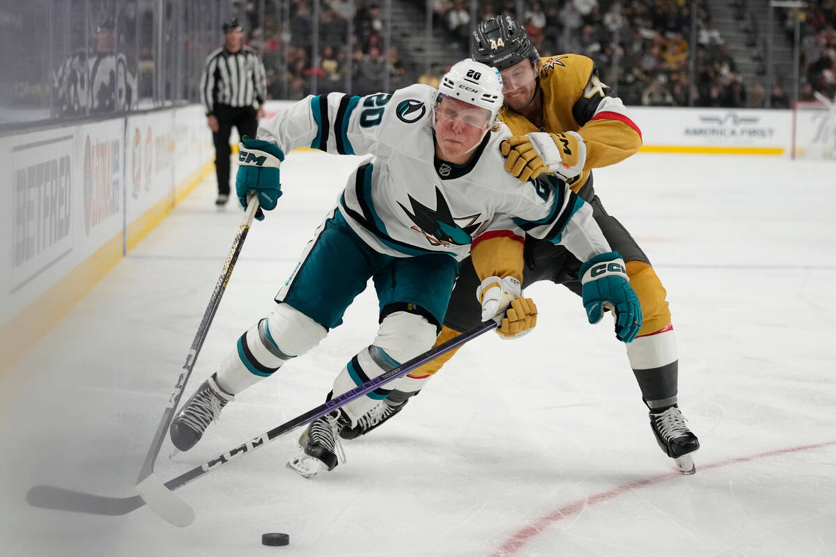 San Jose Sharks left wing Fabian Zetterlund (20) skates around Vegas Golden Knights' Layton Aha ...