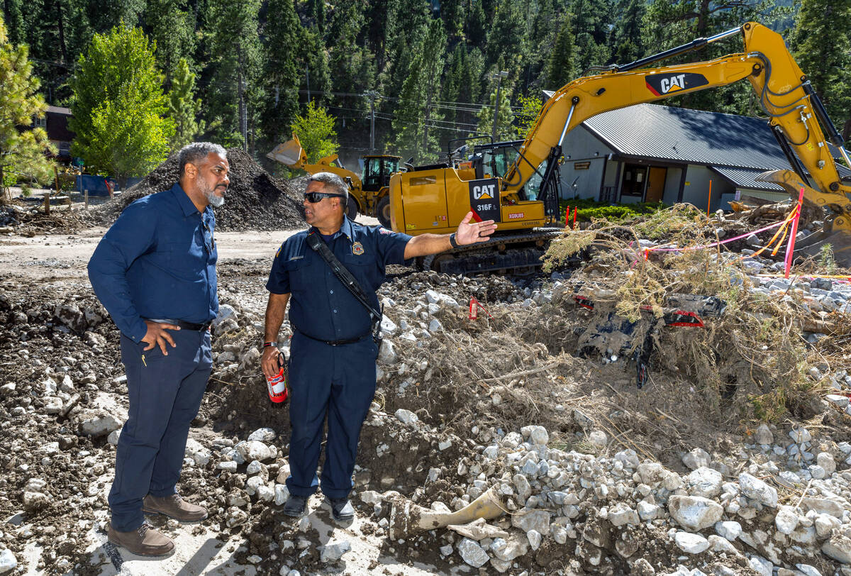 Rep. Steven Horsford, D-Nev., left, talks with Mount Charleston Fire District Chief Jorge Gonza ...