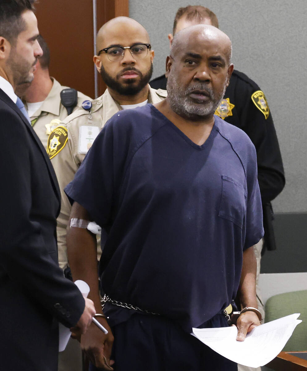 Duane Davis, accused of fatally shooting rapper Tupac Shakur in 1996, is led into the courtroom ...