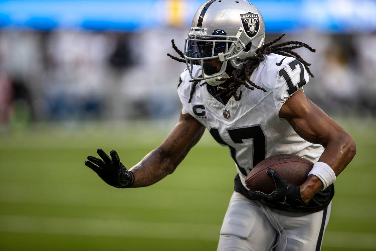 Raiders wide receiver Davante Adams (17) makes a catch during the second half an NFL game again ...