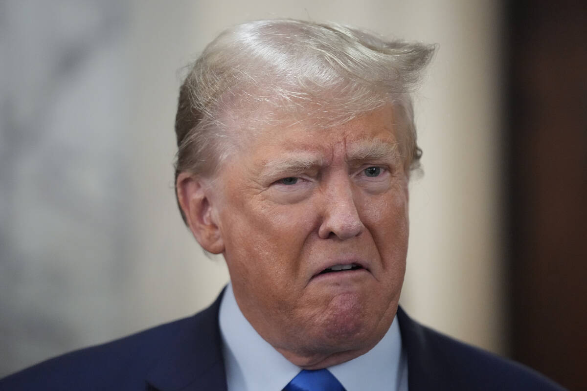 Former President Donald Trump speaks to reporters during a lunch break at New York Supreme Cour ...