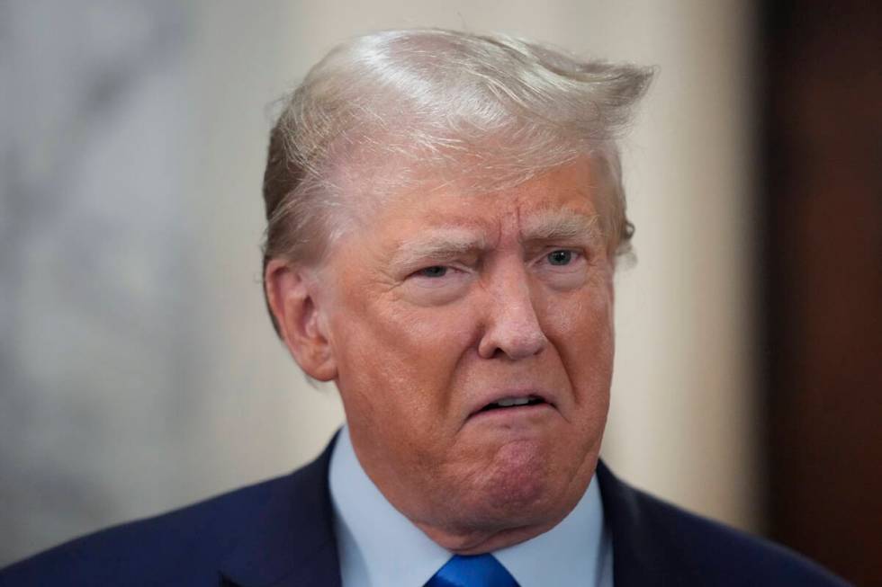 Former President Donald Trump speaks to reporters during a lunch break at New York Supreme Cour ...