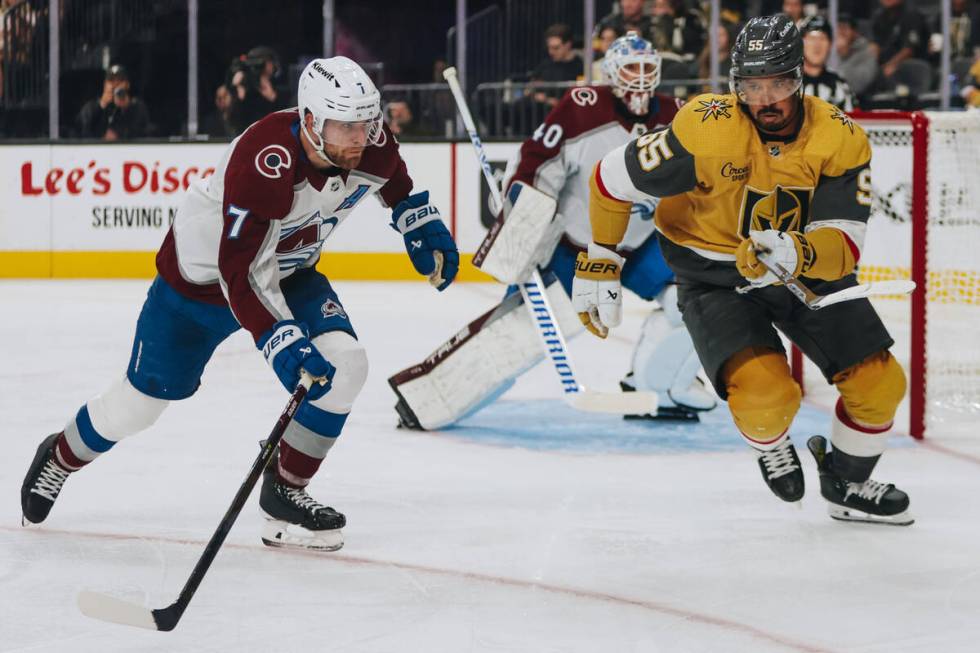 Golden Knights right wing Keegan Kolesar (55) and Colorado Avalanche defenseman Devon Toews (7) ...