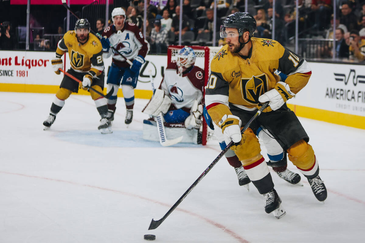 Golden Knights center Nicolas Roy (10) shuffles the puck during a game against the Colorado Ava ...