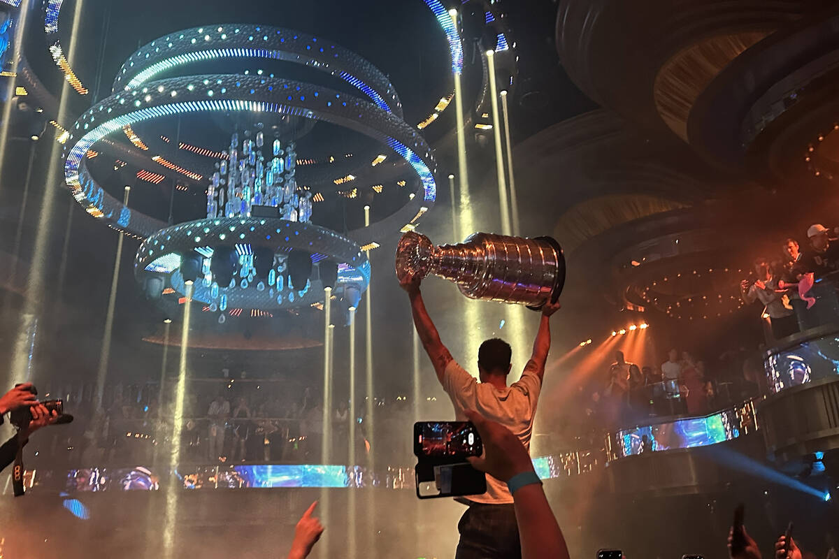 Keegan Kolesar holds aloft the Stanley Cup at Omnia at Caesars Palace after the Vegas Golden Kn ...