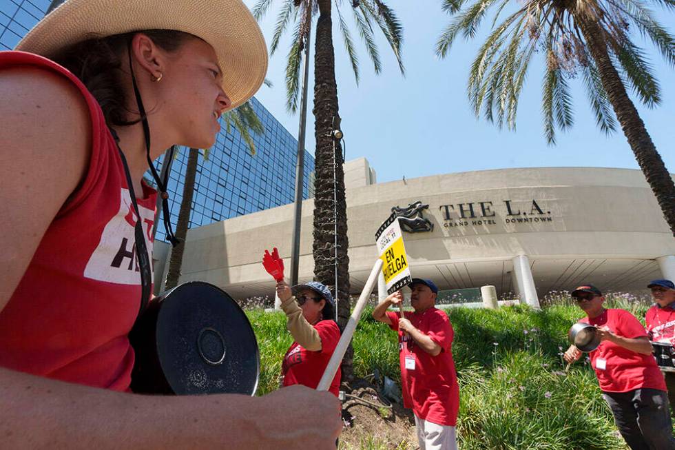 Striking hotel workers rally outside The L.A. Grand Hotel Downtown on Tuesday, July 4, 2023, in ...