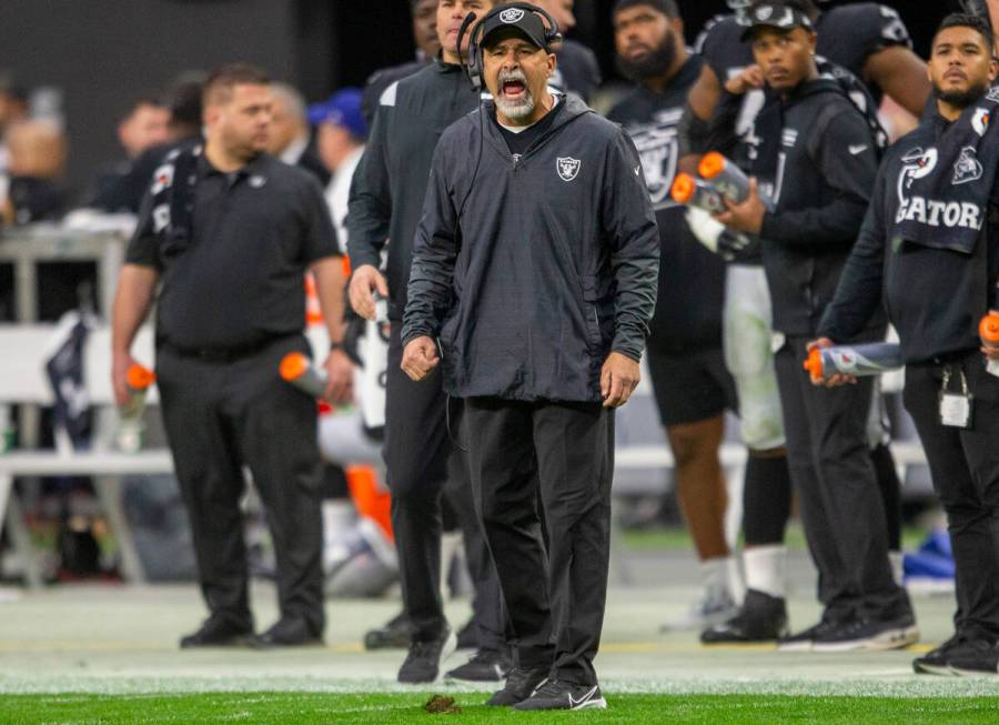 Raiders interim head coach Rich Bisaccia shouts to the team from the sideline during the first ...