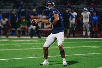 Foothill quarterback Mason Dew throws the ball during a game against Green Valley at Foothill H ...