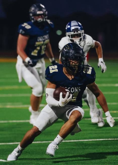 Foothill running back Avant Gates Jr. (21) runs with the ball during a game against Green Valle ...