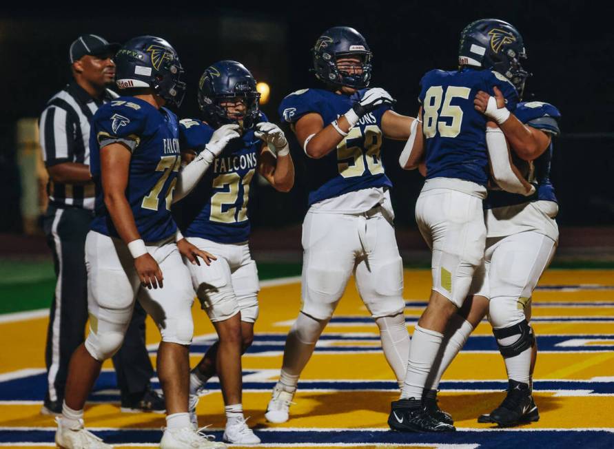 Foothill players celebrate a two point conversion during a game against Green Valley at Foothil ...