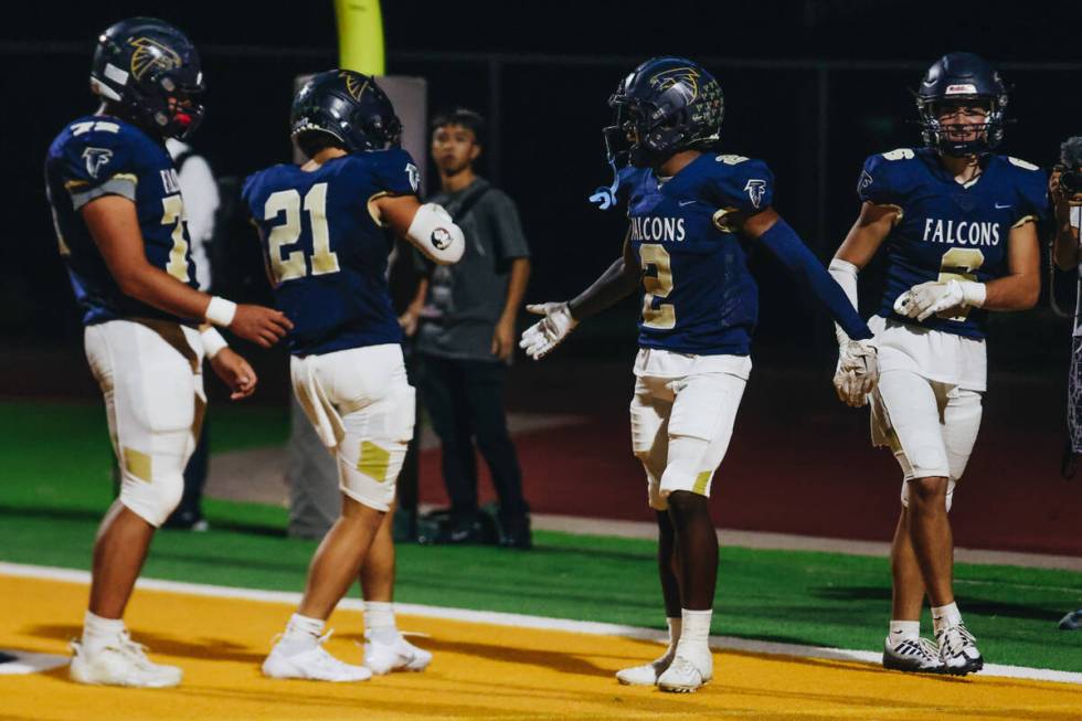 Foothill players celebrate a touchdown by wide receiver Tarrell Mack-Lovely (2) during a game a ...