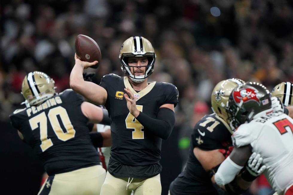 New Orleans Saints quarterback Derek Carr (4) throws a pass in the first half of an NFL footbal ...