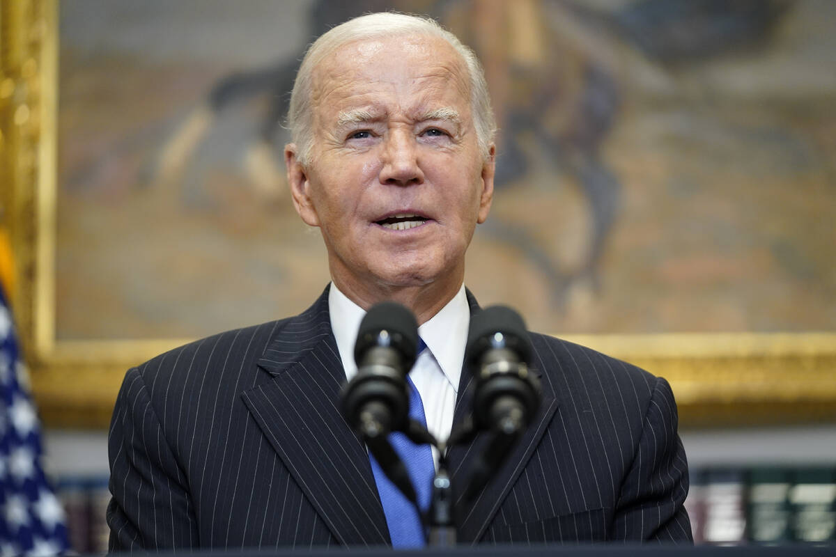 FILE - President Joe Biden speaks about the September jobs report in the Roosevelt Room of the ...